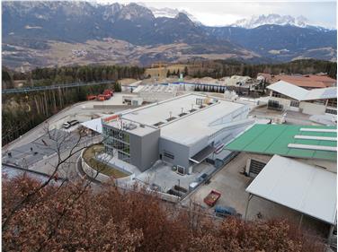 Für den Bau von Infrastrukturen in Gewerbezonen erhalten Gemeinden Finanzierungen, die nun etwas angepasst wurden. Im Bild: Eines der Gewerbegebiete in der Gemeinde Ritten. Foto: LPA/Gemeinde Ritten